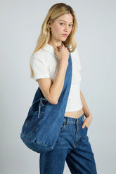 denim sling bag with pocket detail