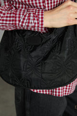 crescent bag with bow stitch detail