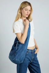 denim sling bag with pocket detail